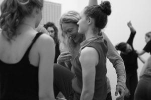 Teacher gestures in front of mover